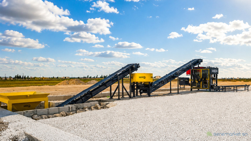machine-de-production-de-parpaing-et-de-paves-en-beton-ensemble-big-1