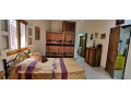 a-vendre-a-ngaparou-une-propriete-de-deux-villas-avec-une-piscine-commune-sur-un-terrain-de-864m2-small-4
