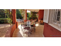 a-vendre-a-ngaparou-une-propriete-de-deux-villas-avec-une-piscine-commune-sur-un-terrain-de-864m2-small-1
