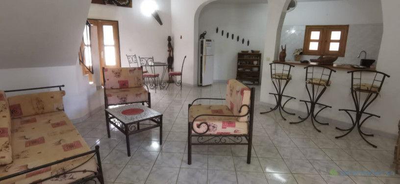 a-vendre-a-ngaparou-une-propriete-de-deux-villas-avec-une-piscine-commune-sur-un-terrain-de-864m2-big-2