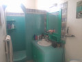 a-vendre-a-warang-une-superbe-villa-atypique-de-5-pieces-sur-un-terrain-de-612m2-joliment-arbore-a-10-minutes-a-pied-de-la-plage-small-4
