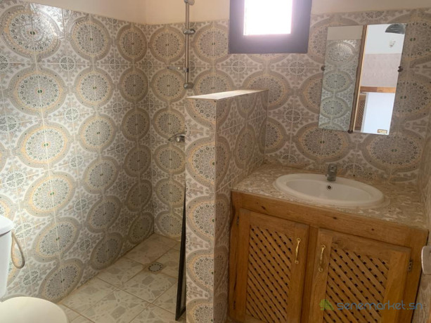 a-vendre-a-ngaparou-deux-villas-tres-bien-situee-proche-de-la-route-et-de-locean-sur-un-terrain-de-220m2-big-3