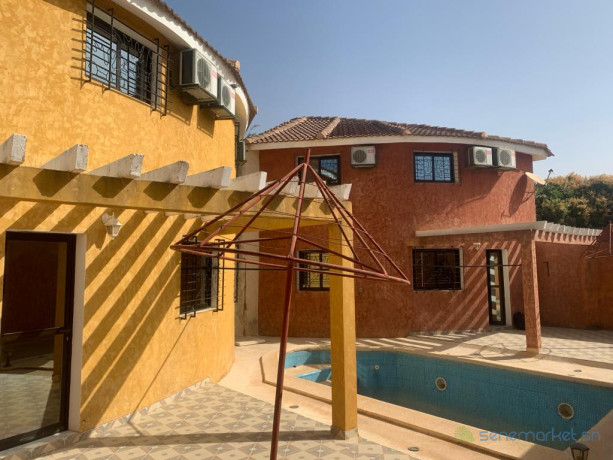 a-vendre-a-ngaparou-deux-villas-tres-bien-situee-proche-de-la-route-et-de-locean-sur-un-terrain-de-220m2-big-0
