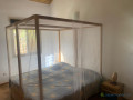 a-vendrea-ngaparou-une-belle-propriete-au-charme-africain-chic-composee-de-trois-cases-proche-des-commodites-small-4