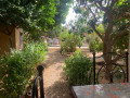 a-vendrea-ngaparou-une-belle-propriete-au-charme-africain-chic-composee-de-trois-cases-proche-des-commodites-small-1