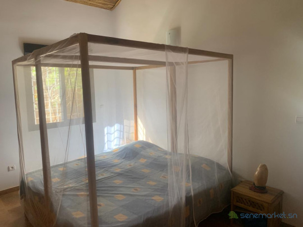 a-vendrea-ngaparou-une-belle-propriete-au-charme-africain-chic-composee-de-trois-cases-proche-des-commodites-big-4