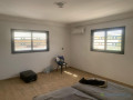 a-vendre-a-ngaparou-proche-de-lecole-bilingue-une-grande-villa-neuve-de-neuf-pieces-sur-un-terrain-de-535m2-small-4